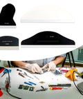 Badass Silicone Screen Protector Scraper For Phone Tablet Laptop Film Application Smooth Glide Anti Scratch Applicator With Comfort Grip Hella Easy Precision Install Tool For Techs, set of four scrapers on a repair table.