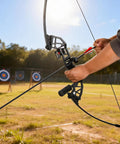 Archer using 30 Inch Carbon Arrow Set With Removable Tips, 14 Pcs, Spine 500, 100 Grain Broadheads at outdoor target practice