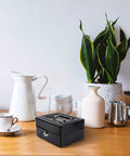 Compact Lock Box For Cash And Jewelry Storage, Lockable Small Black Safe With Key For Home And Office Security on table