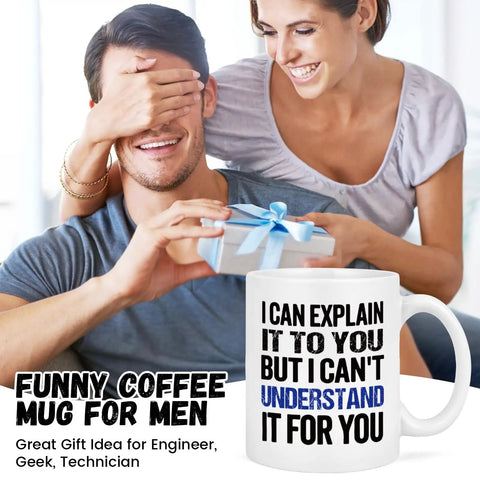 Man receiving Funny Engineer Coffee Mug I Can Explain It To You But I Cant Understand It For You Gift with woman covering his eyes