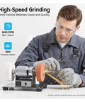 Super Cool 3000-6000Rpm Mini Bench Grinder With Dual Grinding Wheels, 7 Speed Settings And Reversible Motor in use, sharpening materials, sparks flying.