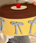 Legit Handwoven Cotton Storage Basket With Snug Dustproof Lid Solid Home Hub Organizer Perfect For Bedroom Clothes And Living Room Gear Nifty Space Saving Set Up You Will Score, yellow basket with blue bows and brown lid.