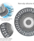 Top view of gray dome-shaped drain protector with non-slip silicone ring and small holes. Hair Catcher For Tub And Shower Drains, Dome Shaped Drain Protector That Fits Pop Up And Regular Drains, No Fuss, Keeps Hair, Toys And Debris Out, Lets Water Flow Free, Patented Design.