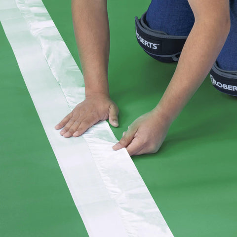 Top Shelf Premium Acoustical Underlayment Roll For Hardwood Floors 100 Square Foot Sound Dampening Foam being installed with seam tape.