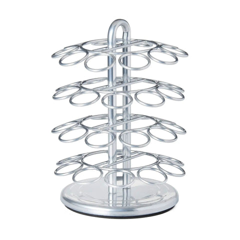 Silver rotating coffee pod holder for Nespresso capsules with multiple circular slots, designed for countertop use in kitchens.