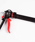 Extreme Duty 9 Inch Caulk Gun Workhorse With 26 To 1 Thrust Ratio And 950 Lb Force, featuring ergonomic rubber trigger grip.