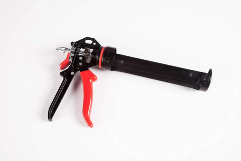 Extreme Duty 9 Inch Caulk Gun Workhorse With 26 To 1 Thrust Ratio And 950 Lb Force, featuring ergonomic rubber trigger grip.