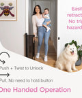 Woman holding baby and dog next to retractable baby gate for stairs and doorways, 33 inch tall by 55 inch wide, mesh safety gate.