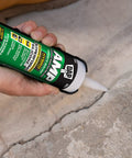 Person applying Gray Concrete Sealant For Driveways, Steps, And Sidewalks, All Weather Tough As Nails Hybrid Polymer Sealant, 9 Oz
