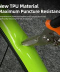 Testing puncture resistance of 2 Pack Gravel TPU Bike Inner Tubes For 700x32-47C And 29 Inch MTB Tires with pliers on green tube.