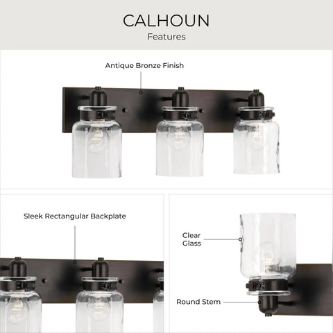 Calhoun Collection Clear Glass Farmhouse Bath Vanity Light with three lights, antique bronze finish, thick glass shades.