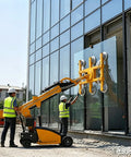 Slick Electric Vacuum Suction Cup Cart Built For No Sweat Heavy Glass And Stone Lifting With Extendable Telescopic Arm Automatic Robotic Handler Smooth Industrial Moving Beast lifting large glass panel on construction site.