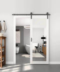 32 Inch By 84 Inch Mirror Barn Door With 5.5 Foot Sliding Hardware Kit Included No Assembly Required, installed in a bathroom.
