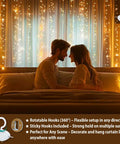 Couple sitting in front of Warm White Curtain Lights For Bedroom 300 LEDs 9.8Ft By 9.8Ft Window Fairy Curtain String Light with hooks