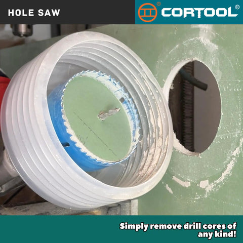 Heavy Duty 6-1/4 Inch Bi Metal Hole Saw Kit With Arbor cutting through a drywall surface, showcasing precision drilling