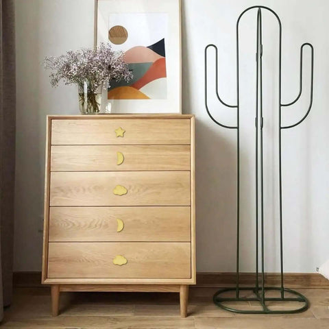 Standout Six Piece Set Of Bright Yellow Ceramic Cabinet Knobs Packing Dang Cool Star Moon And Cloud Shapes To Level Up Your Nursery Dresser Or Kitchen Cupboard Hardware Setup Today on an oak dresser.