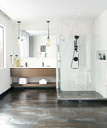 Modern bathroom with a shower and a sleek Align Matte Black 9 Inch Modern Hand Towel Bar For Bath Or Kitchen near the door.