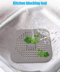 3 Pack 5.5 Inch Silicone Drain Covers With Strong Suction Bases Flat Square Hair Catchers For Showers And Kitchen Sinks Reusable Gray Strainers in kitchen sink with water and leaves