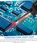 Portable 110V Heat Gun With Temperature Control For Soldering Station Desoldering Tool, shown on circuit board for precision work.