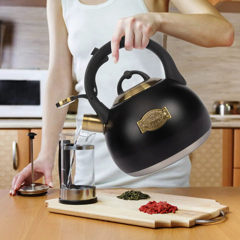 Stovetop Tea Kettle Made From Food Grade Stainless Steel 3.1 Quart Whistling Water Kettle being used in a kitchen