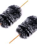 Otter Dampener Bow String Silencer 1 Pair For Recurve Bows Lightweight Vibration Dampener in black and white attached to strings