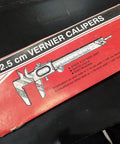 VMRG Non-Digital Vernier Caliper box displaying 12.5 cm size and features for measuring with metric and imperial units.