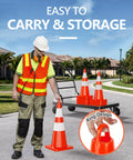Worker carrying 28 Inch Traffic Safety Cones 8 Pack PVC Orange Construction Cone With Reflective Collars on a cart