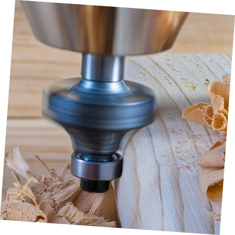 Close-up of a top mounted ball bearing router bit guide kit for woodworking, cutting through wood with precision.