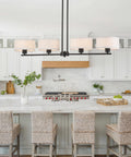 Rectangular Farmhouse Wood Pendant Light With 4 Light Industrial Chandelier over kitchen island in rustic country style.