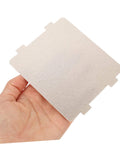 Hand holding a mica sheet from the Ten Piece Microwave Cover And Waveguide Mica Sheets Set For Oven Cavity Insulation And Heat Resistance