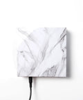 Marble finish square base for Levitating Moon Lamp With Nonstop Rotation, showing plug-in cable for magnetic levitation light support.