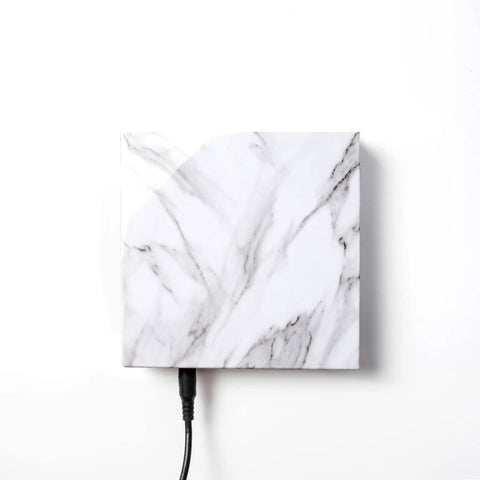 Marble finish square base for Levitating Moon Lamp With Nonstop Rotation, showing plug-in cable for magnetic levitation light support.