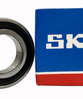 6006-2RS Deep Groove Ball Bearing 30x55x13mm beside SKF branded box, double rubber sealed high speed radial bearing.