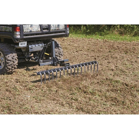 Landscape Rake Attachment For ATV Or UTV, 60 Inch Wide With 17 Tines, Heavy-Duty Yard Leveler clearing debris in field