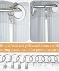 Close-up of No Sweat Curtain Pull Wands 46 Inch White Acrylic Drapery Rod Openers with hooks and rings for grommet curtains.