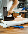 Killer Pneumatic 18 Gauge Brad Nailer Crafted Light As A Feather From Die Cast Aluminum in use for trim work on wood.