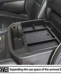 Black Boss Level Power Sliding Center Console Organizer for 2021 to 2026 GMC Yukon Tahoe Suburban in armrest tray view