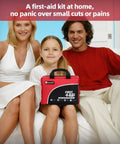 Family sitting on a sofa holding Must Have 160 Piece First Aid Kit With Ice Pack Emergency Blanket And Moleskin Pad for safety.