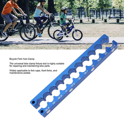 Must-Have Bicycle Fork Hub Clamp With CNC Milled Aluminum Alloy Axle Spindle Vise Insert For Precise Bike Repair, Maintenance, And Wheel Adjustments In Your Home Workshop Or Local Bike Park. Blue bike fork hub clamp tool featuring multiple size slots for maintenance.