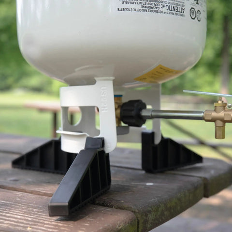 One Pound Propane Refill Kit For Refillable Tank No Fuss Fast Sixty Second Refill With Stabilizing Feet in use outdoors