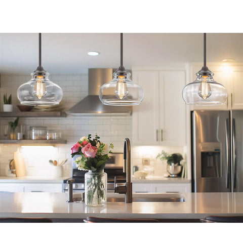 Clear Schoolhouse Glass Pendant Shade Replacement 9 Inch by 6 Inch for Pendant Lights Modern Chandelier Glass Upgrade Fits Threaded Medium Base Sockets Hang Up or Down for Easy Remodel displayed in modern kitchen setting