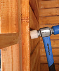 Double Face Rubber Mallet 12 Oz With White Nylon Head And Blue Soft Face in carpentry work on wooden surface