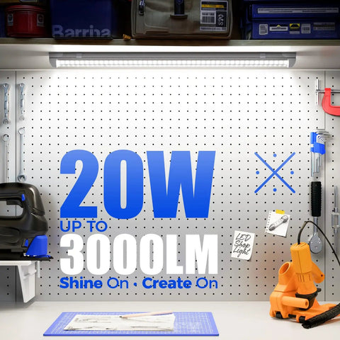 2Ft LED Shop Light Strip 20W 3000LM 5000K Daylight T8 Fixture installed above a workshop pegboard with tools