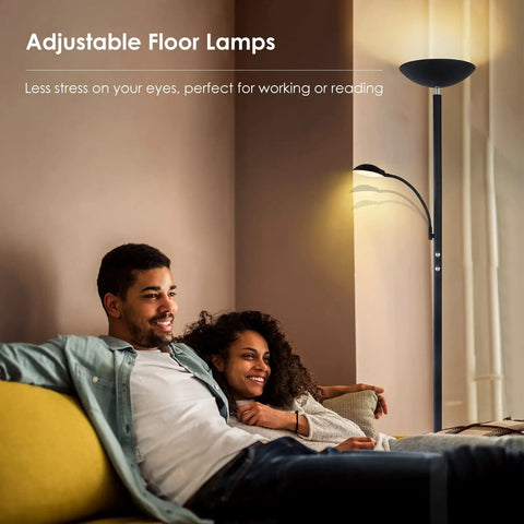 Couple relaxing in living room with Dimmable LED Floor Lamp With 20W Main Light And 5W Reading Lamp, modern black design in warm glow