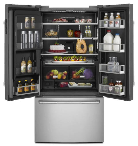 Open refrigerator filled with various groceries including drinks, fruits, and dairy products on visible shelves.