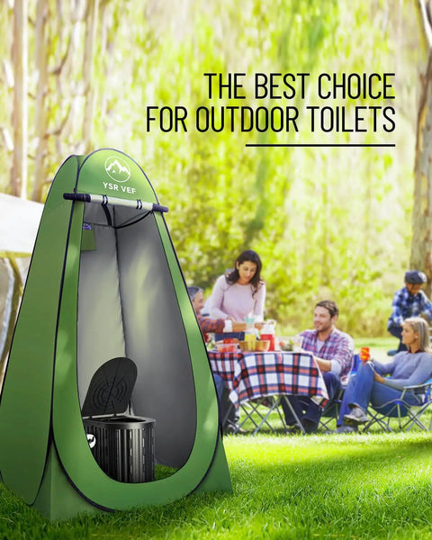 Go To Portable Camping Toilet Kit with Pop Up Privacy Tent in green, shown in an outdoor setting with people in the background.