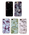 Collection of iPhone cases with marble patterns in various colors, including black, blue, purple, green, and white.