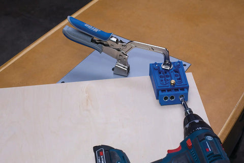 Automaxx Heavy Duty Bench Clamp System with automatic thickness adjustment on workbench in steel shop