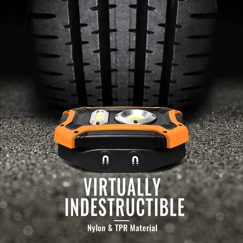 Beast Rechargeable LED Work Light 1500 Lumen COB With Magnetic Base shown under a car tire to demonstrate durability