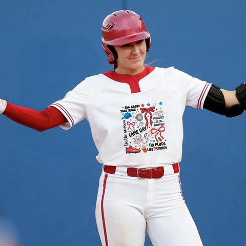 Player wearing T-shirt with 10 Pack Baseball DTF Iron On Transfers For T Shirts And Apparel Ready To Press Heat Transfer Sheets design